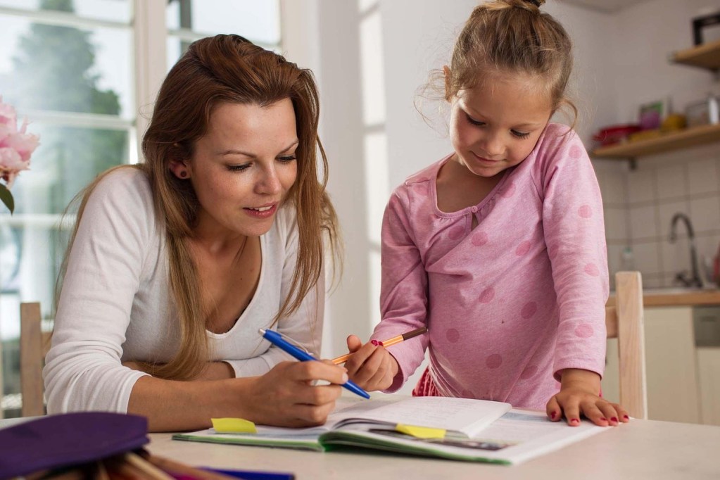 Mother and daughter preparing their budgeting Activities for Kids for Back-to-School Shopping