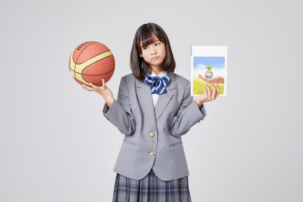 Teenage girl having to choose between tow extracurricular activities representing the "Giving Up Something" Concept of the opportunity cost formula