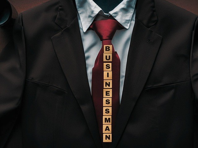 Jacket, shirt and tie with the word businessman on the tie