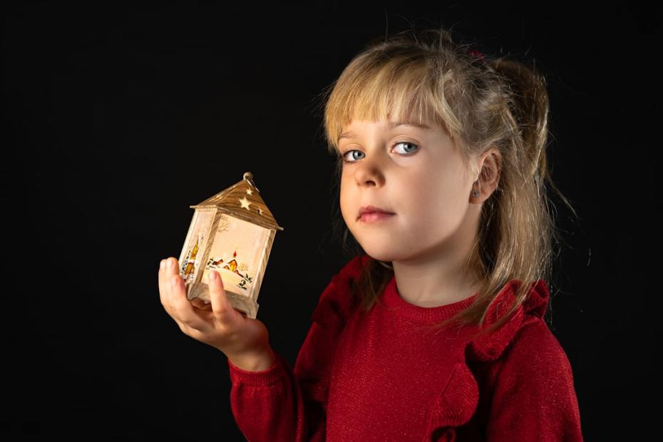 Child holding a gift representing beyond toys How to Invest in Your Child's Future